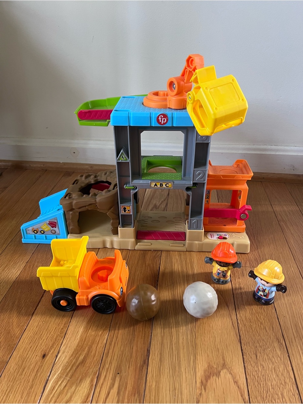 Fisher-Price Construction Play Center in Orange, Yellow, Blue and Green